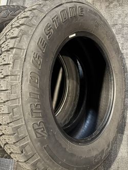 2- Bridgestone P265/65R18 Truck Tires