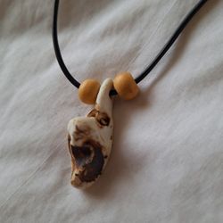 Clay Face Pendant On 20" Leather Cord