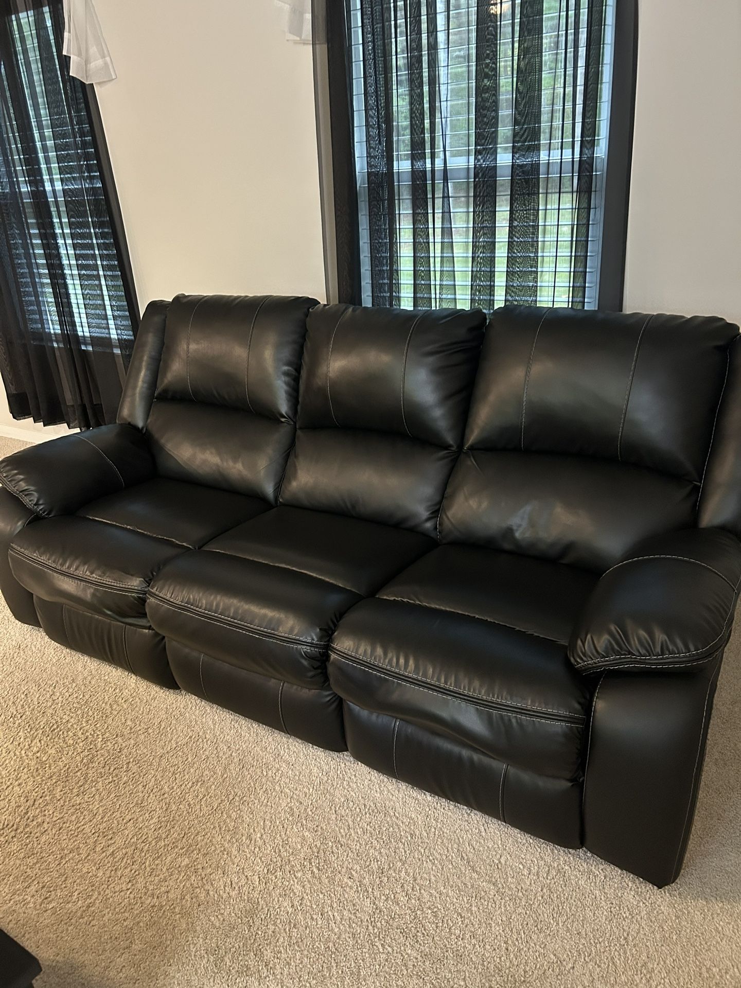 Ashley’s Electric Leather Recliner Sofa