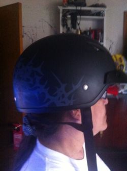 Motorcycle helmet with blackface shield