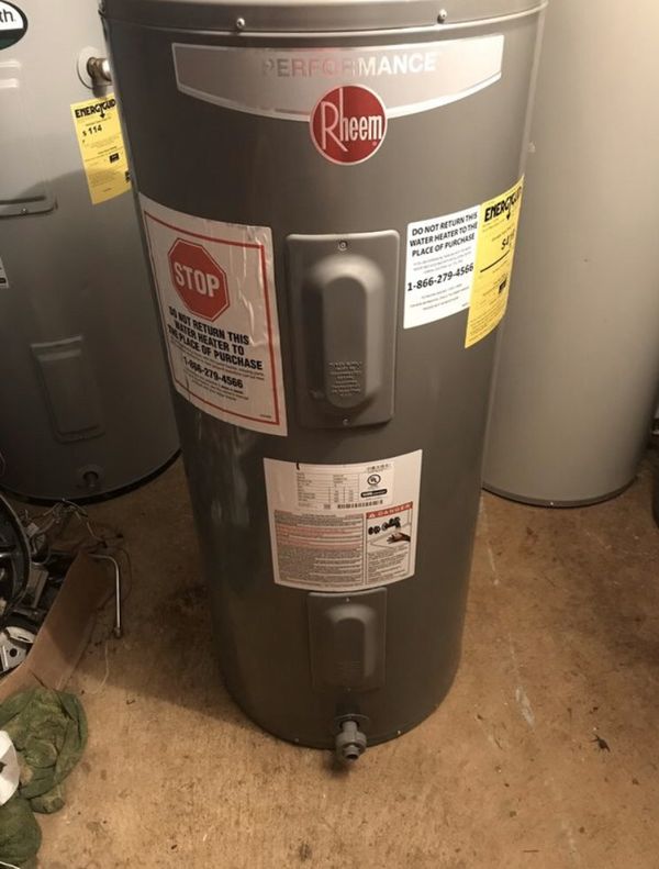 Rheem 40 gallon electric water heater. Still has factory has year