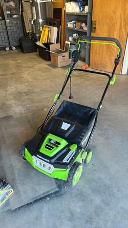 Synthetic grass sweeper electric