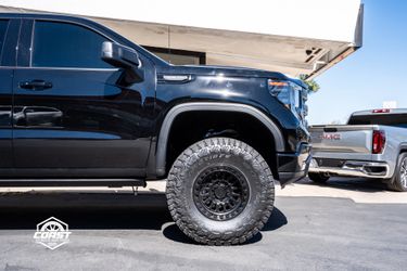KMC IMS All Black 17” 6x5.5 W/ 37” Toyo Rt Trail Wheel Package 