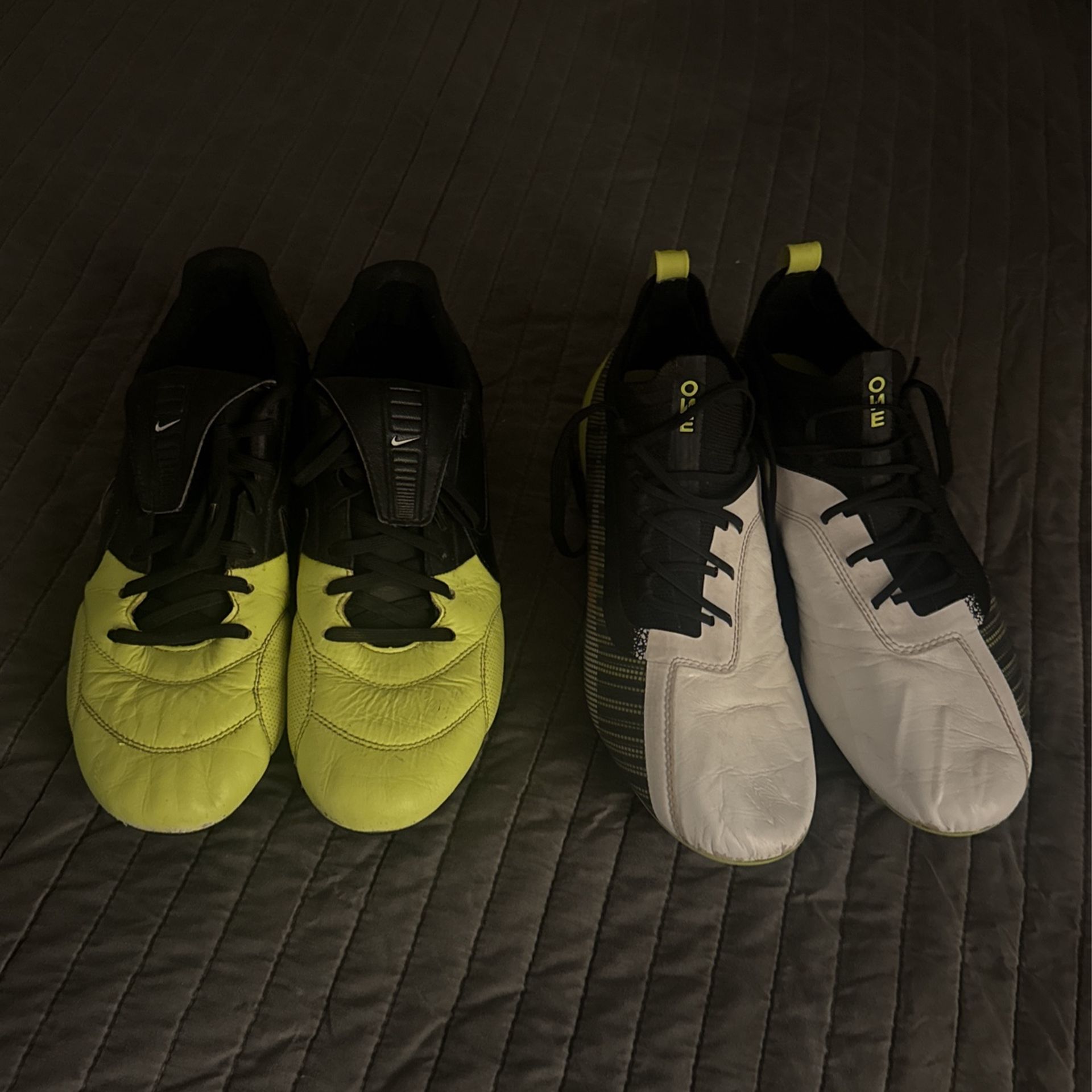 Two Pairs Of Used Cleats