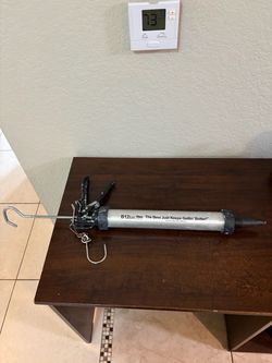 Sausage caulking gun