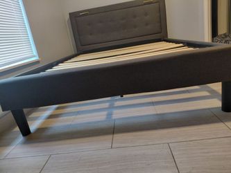 Gray Upholstered Bed Frame with Tufted Headboard