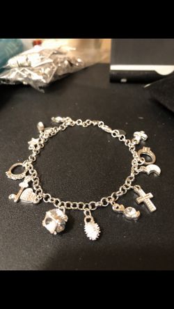 Women’s sterling silver plated love charm bracelet 7/1/2 inch no refunds