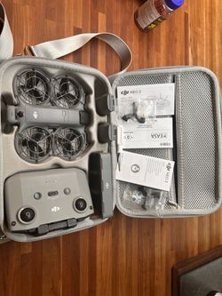 DJI NEO 2. Fly More Combo with case. RC-N3 remote.