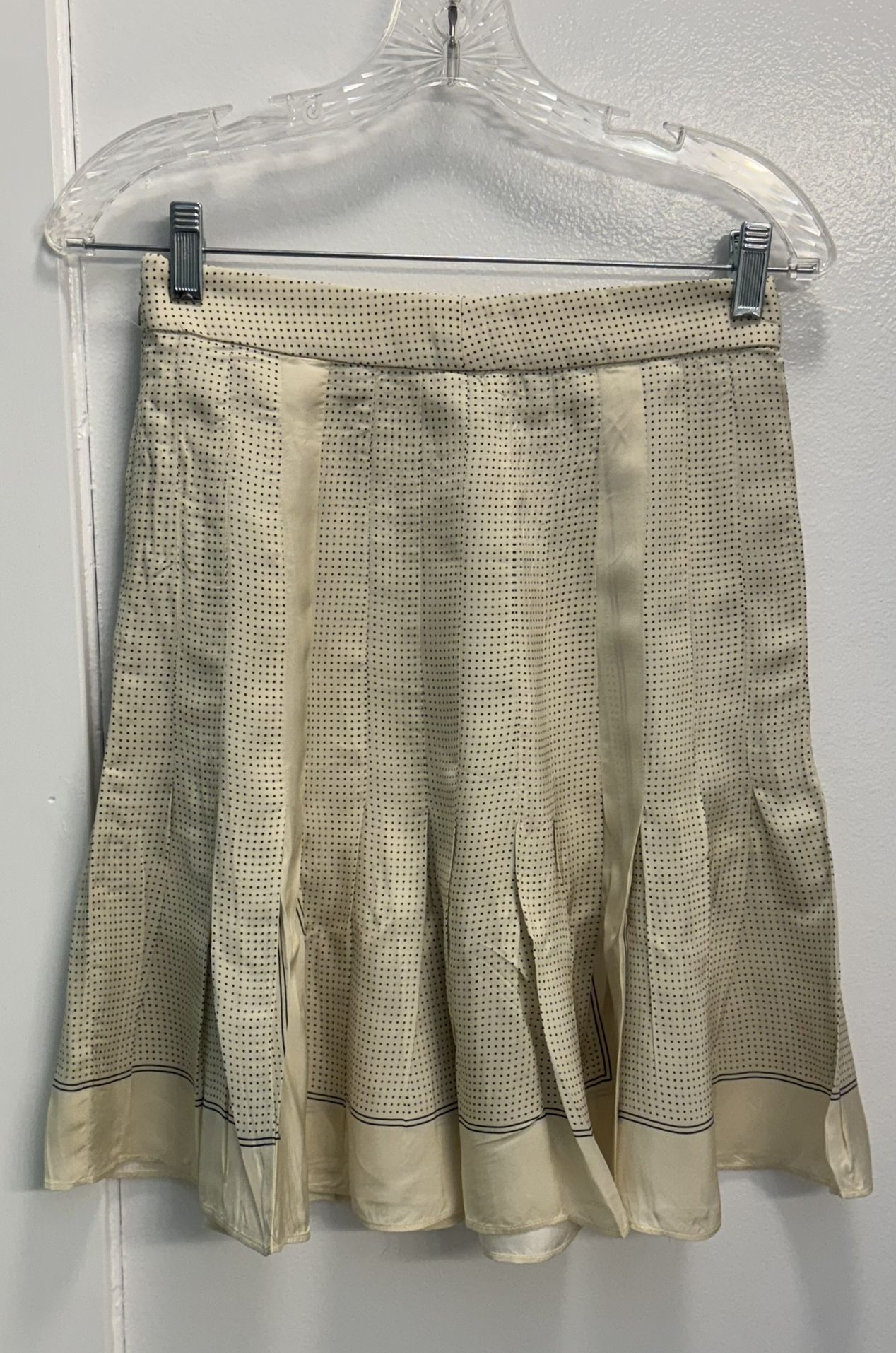 Woman’s J. Crew pleated scarf-print skirt in drapey viscose twill.