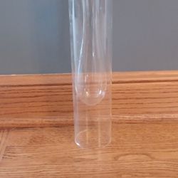 Beaker Bud vase, clear glass 12.5 inches high, vase inside of base