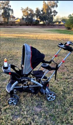 "Sit and stand " Stroller for two children.