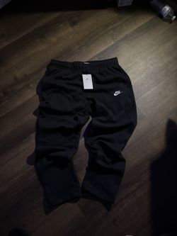 black uncuffed nike sweatpants