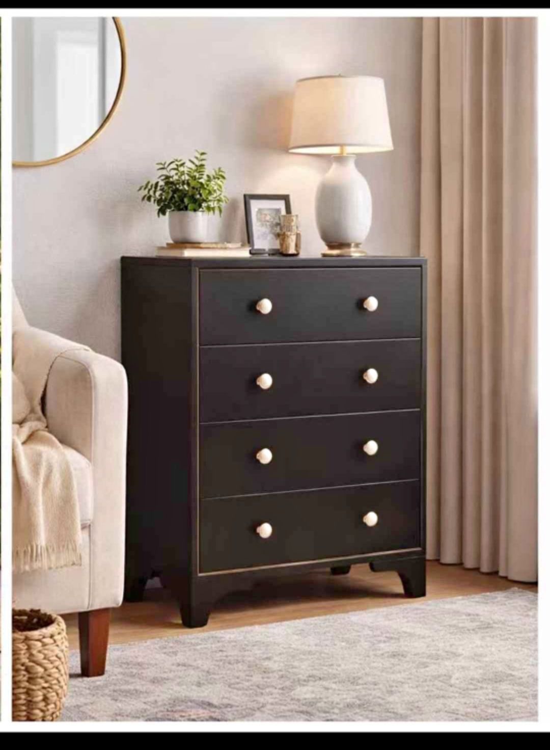 Brand new. Still in box.. Stylish black 4-drawer dresser. Has cool gold trim and white/gold round knobs. Drawers open smoothly. Great for bedroom, hal
