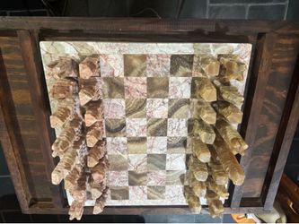 Onyx marble chess set. Over 50 years old . Ornate carved chess table included
