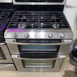Whirlpool Gas stove stainless steel double oven Good Condition We Delivery