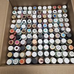 art supplies.  Acrylic paints and paint holder