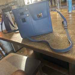 Blue crossbody bag with adjustable strap