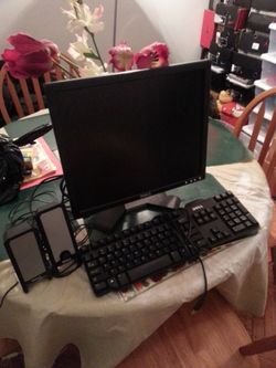 Computer monitor, keyboard and speakers