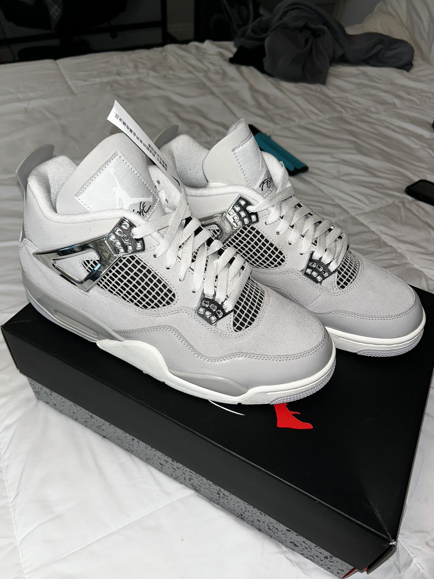 Jordan 4 Retro Frozen Moments