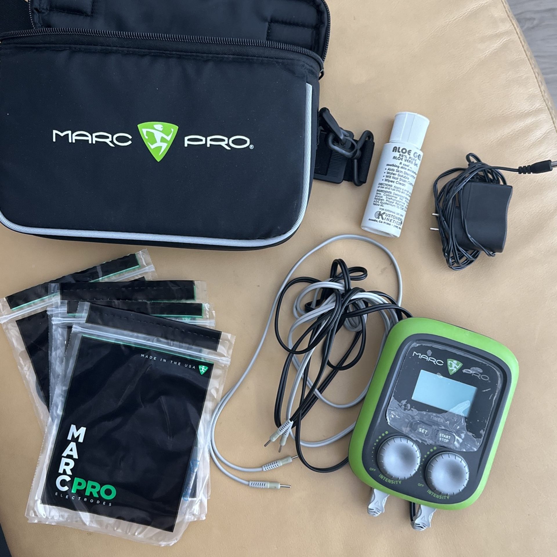 Marc pro - Recovery/Muscle Stimulator w/ Pads (Lightly Used)