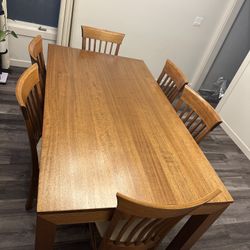 Wooden Dining Table With 6 Cushioned Chairs
