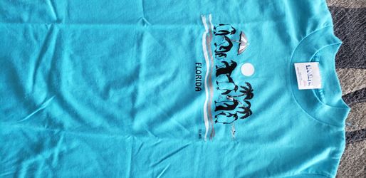 Youth size M 10-12 "Florida" T- shirt w penguins and palm trees NEW.