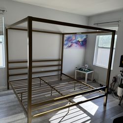 Gold canopy bed frame