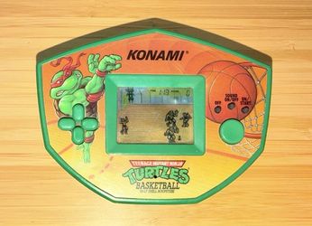 Vintage TMNT Konami Handheld Four on Four Teenage Mutant Ninja Turtle Video Game