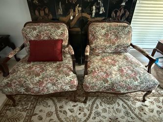 Pair of French provincial bergere chairs