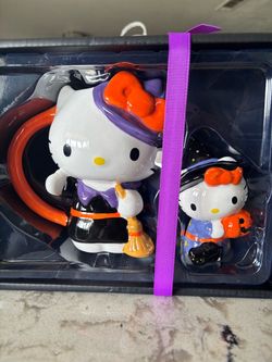 Hello kitty mug and figurine set
