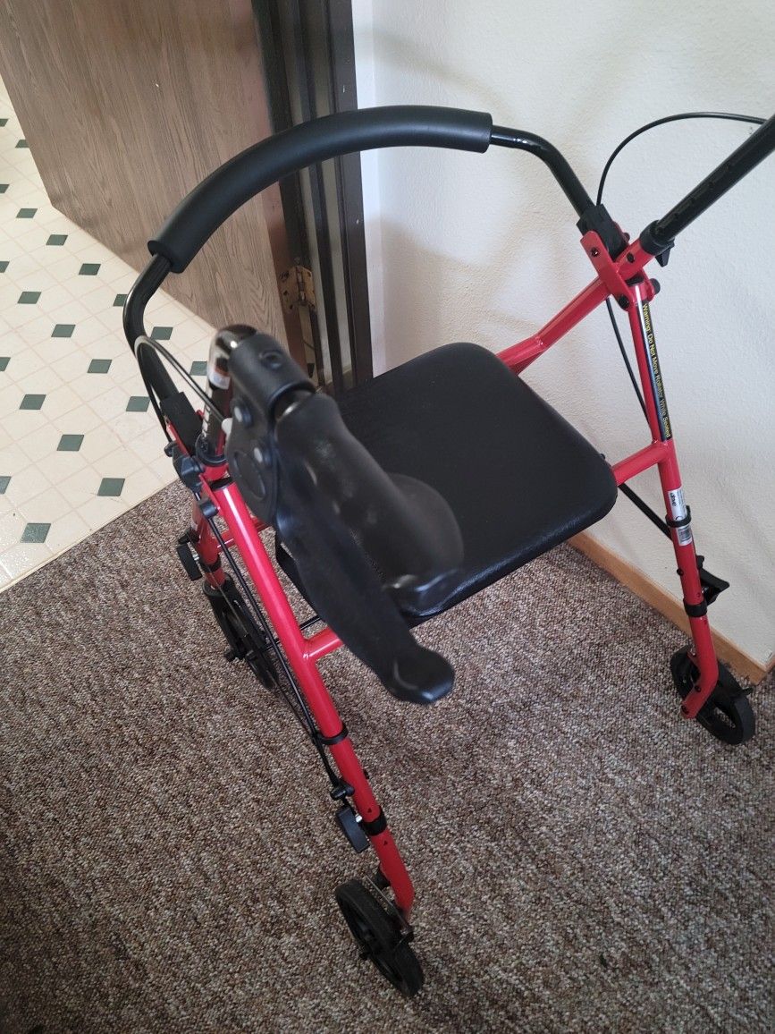Like Brand New Walker With Seat. $45