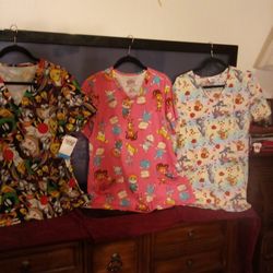 Three Scrub Shirts