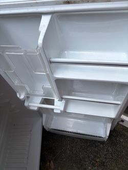 Refrigerator/ freezer. 33” tall.