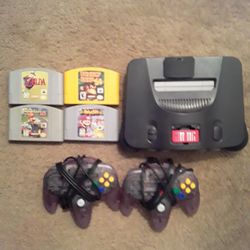 Nintendo 64 With Expention pack And 2 Controllers And 4 Games. 