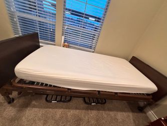 Twin VGC electronic hospital style bed