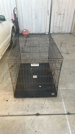 Una jaula para su perro, muy buenas condiciones muy barata