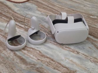 Meta Oculus Quest 2 VR headset, clean with new headstrap and leather face pad upgrade.