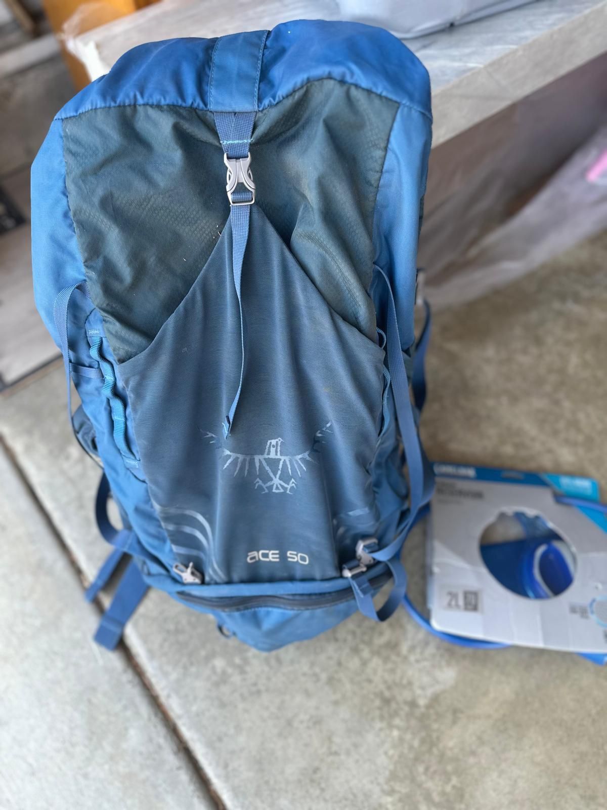 REI hiking bag & portable water reservoir