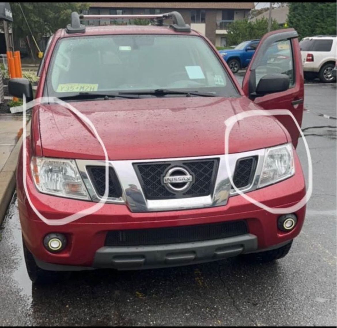 09-21 Nissan frontier OEM headlights