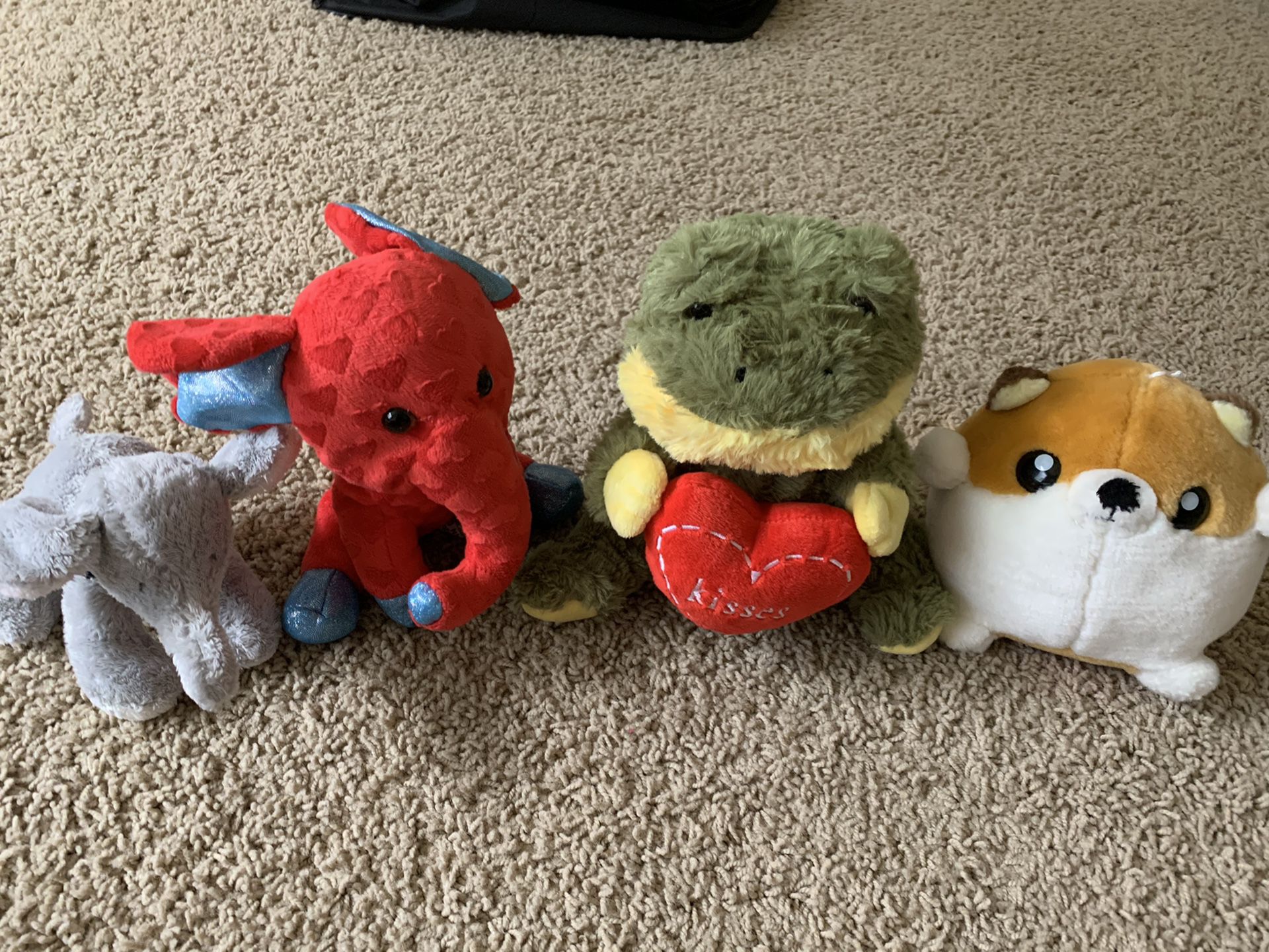 Assorted small stuffed animal toys