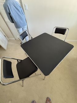 Chrome and black card table & 3 folding chairs