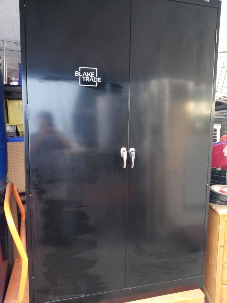 Used Metal Storage Cabinet (Uline). 78"H 48"W 24"D. Has 4 Adjustable Shelves. Has Key. I Can Deliver Local For Extra.