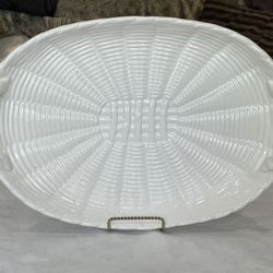 White ceramic oval serving platter with basketweave design and rope handles. 18.75”x 13” Not Including Handles