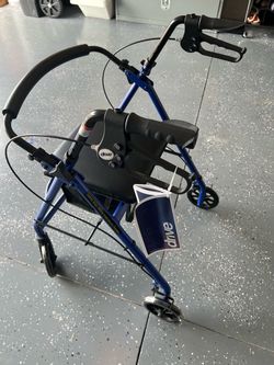 Drive Medical Blue Folding WaDrive Medical Blue Folding Walker with Seat and Bag