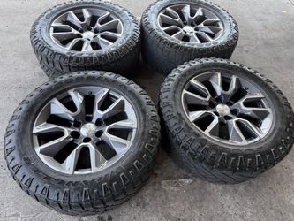20” Chevy stock rims with Goodyear Duratrac rims for sale 6 lug 33”