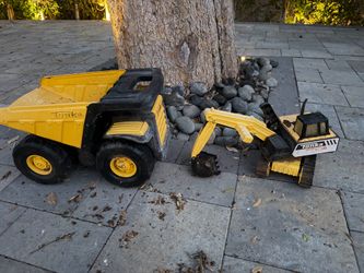 Excavator and dump truck
