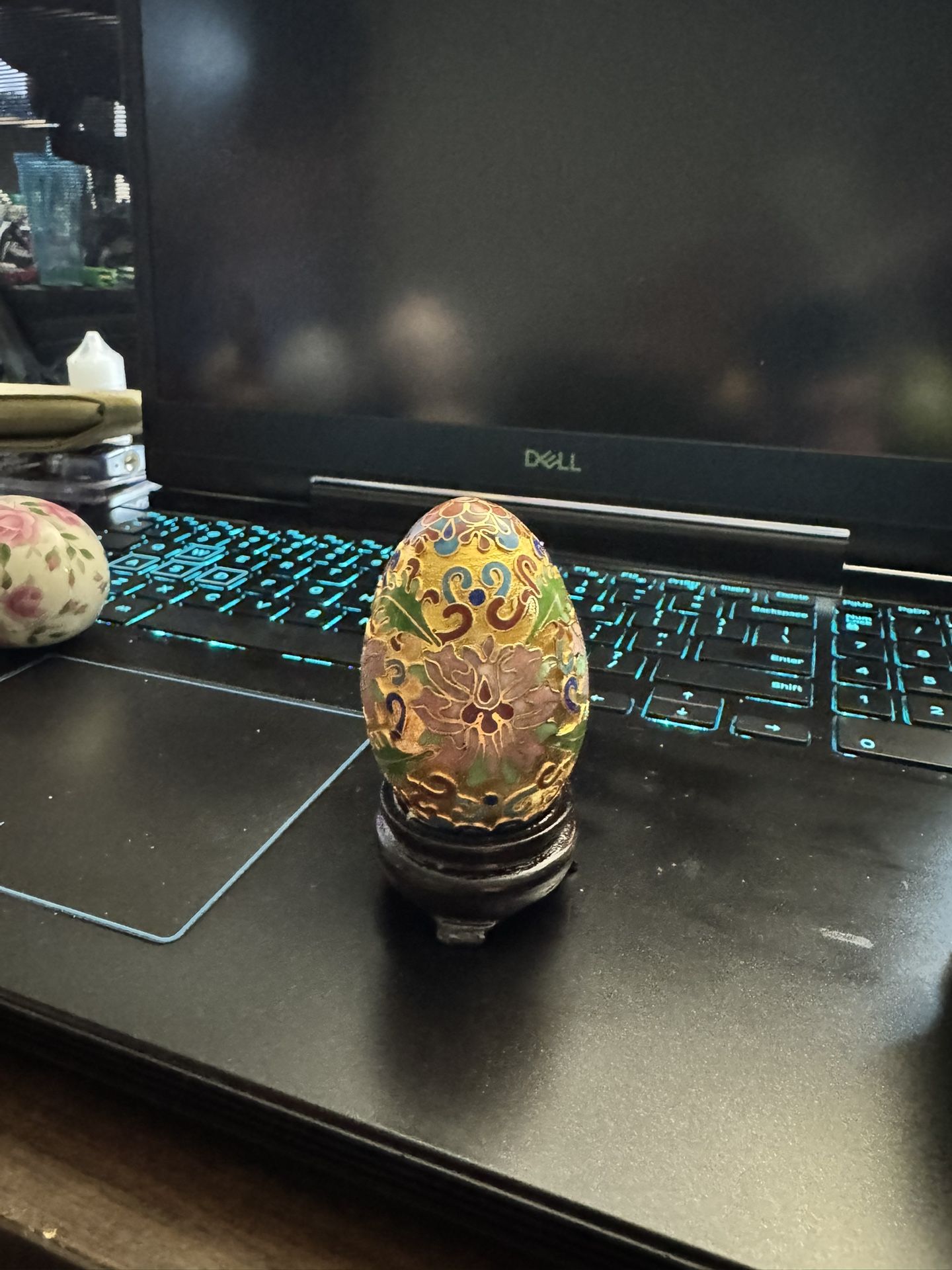 Chinese Champleve Cloisonne' Egg with floral and leaf and scroll motif.