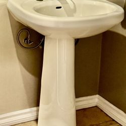 White Pedestal Sink With Faucet