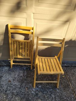 2 folding wood chairs
