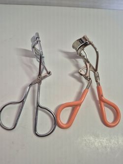 2 eye lash curlers